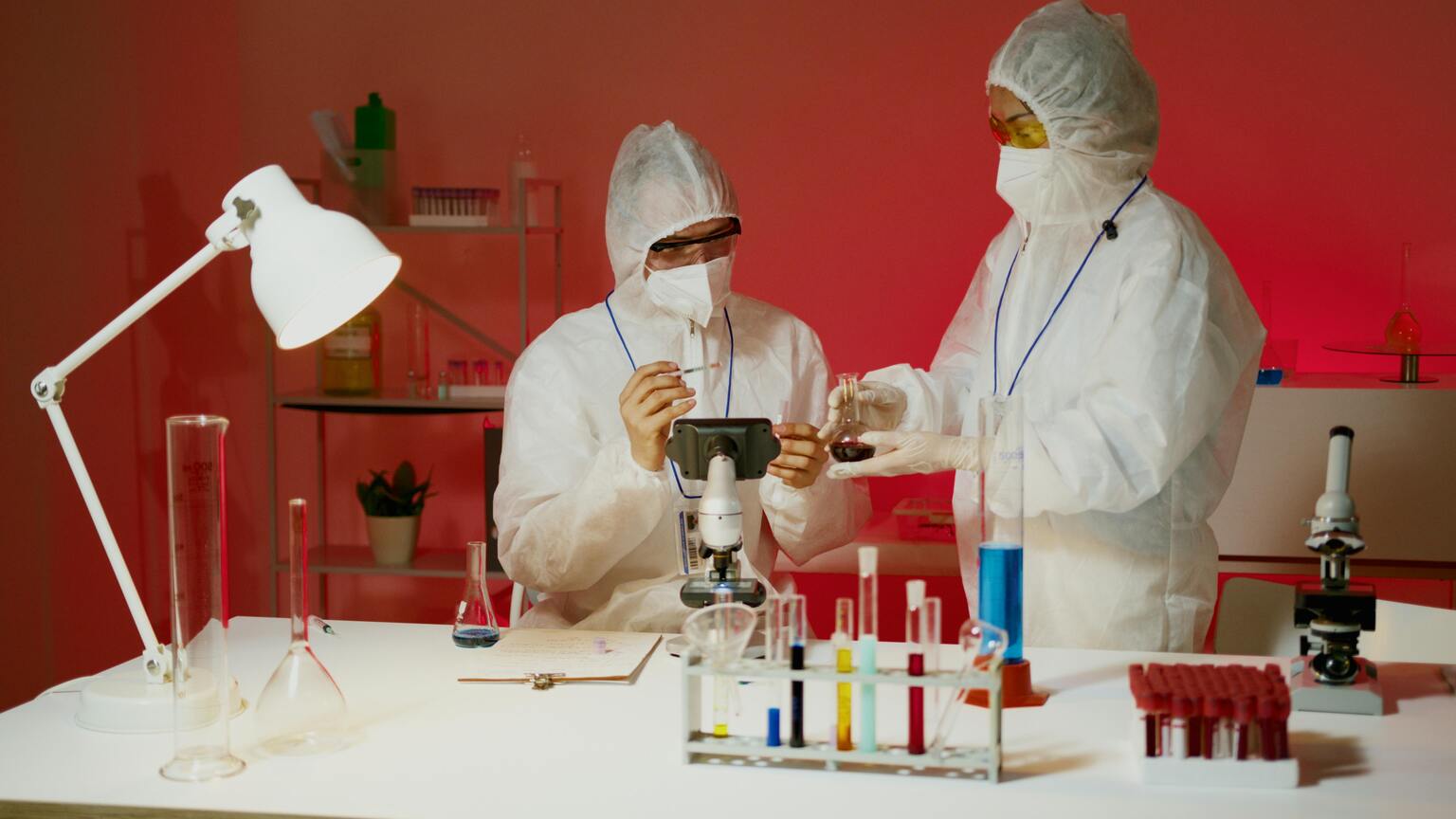 two laboratory workers